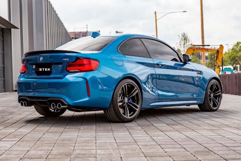 BMWM2ACTION15side15back edit 1920w STEK Window Tint: Enhance Privacy & UV Protection for Your Boise Vehicle CITYNAME, STATE